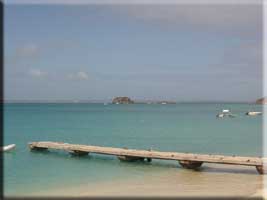 Pier and Creole Rock behind the lolos